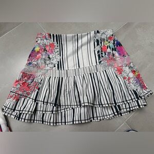 Lucky in Love, tennis skirt with built-in shorts and gently used.